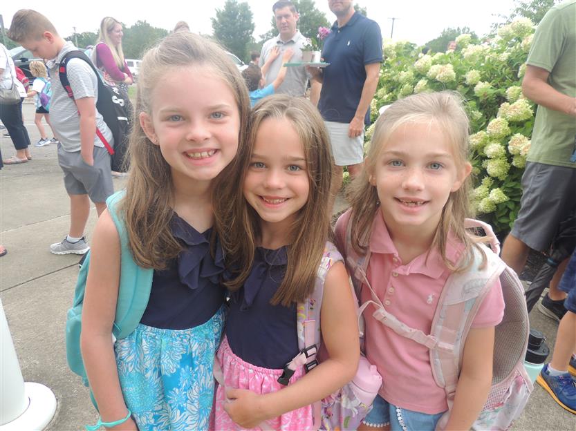 People smile on the first day of school